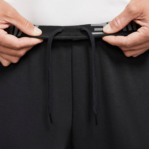 Nike tapered fleece pants best sale